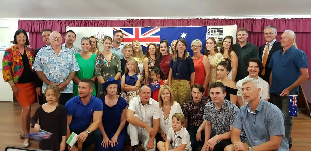 Community group photo with the Australian flag